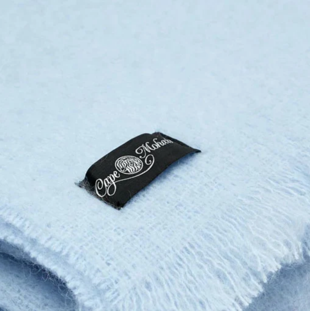 Close up of blue cape mohair wool throw